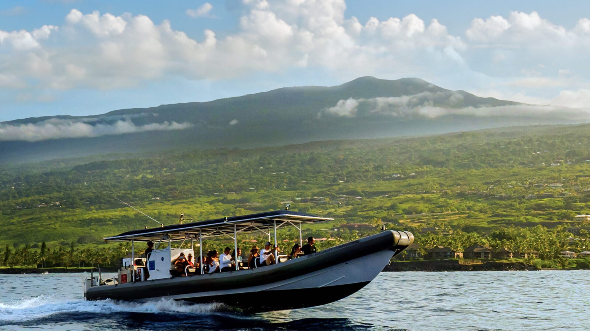Body Glove Kona Explorer boat cruising across the water