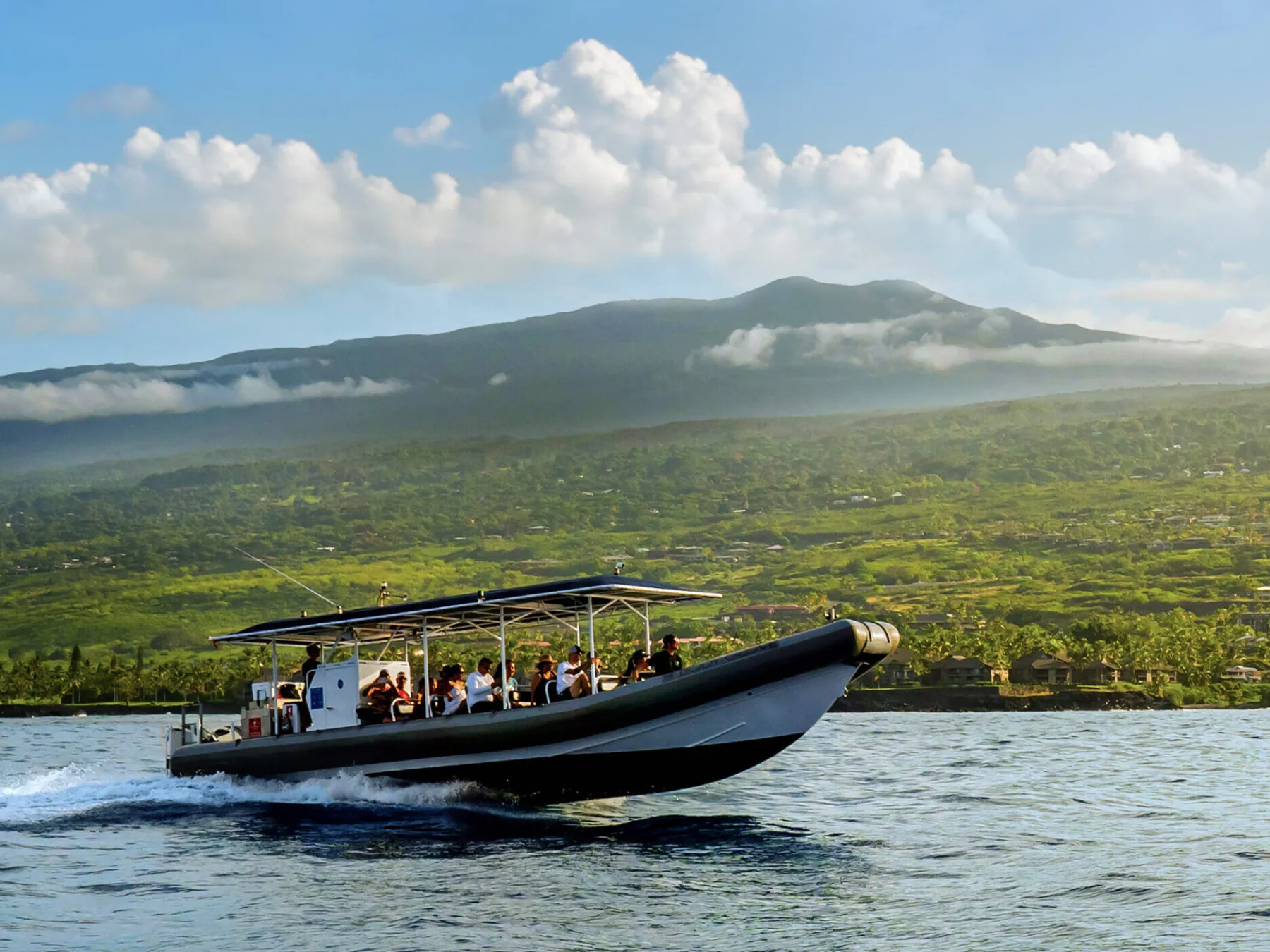Body Glove Kona Explorer boat cruising across the water