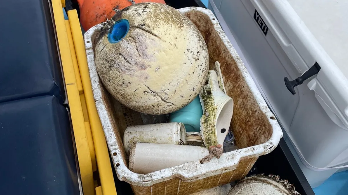 a truck cake sitting on top of a car