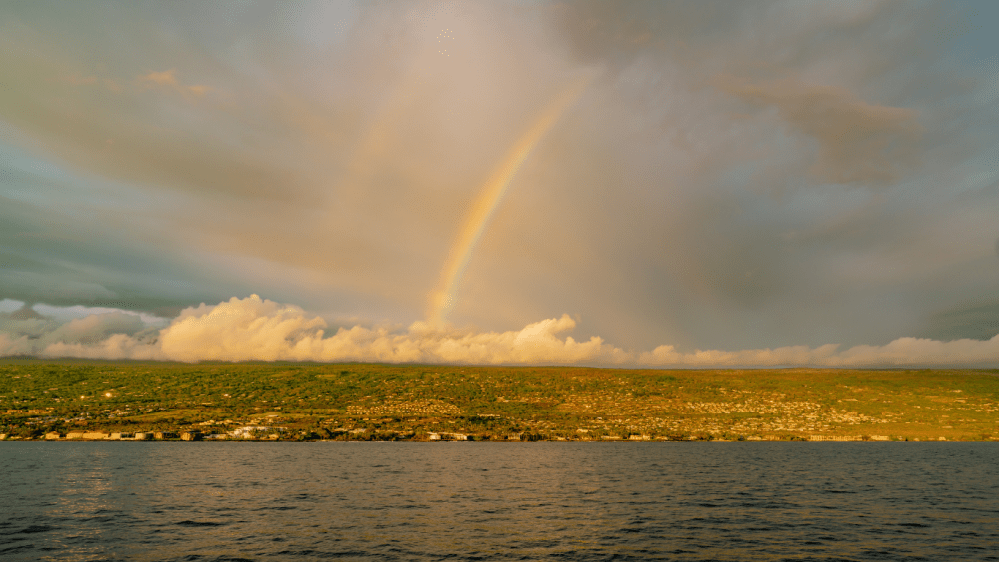 a double rainbow over kona, hawaii