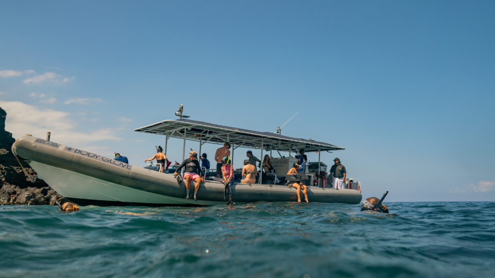 people on a body glove super raft snorkel tour during a week in hawaii