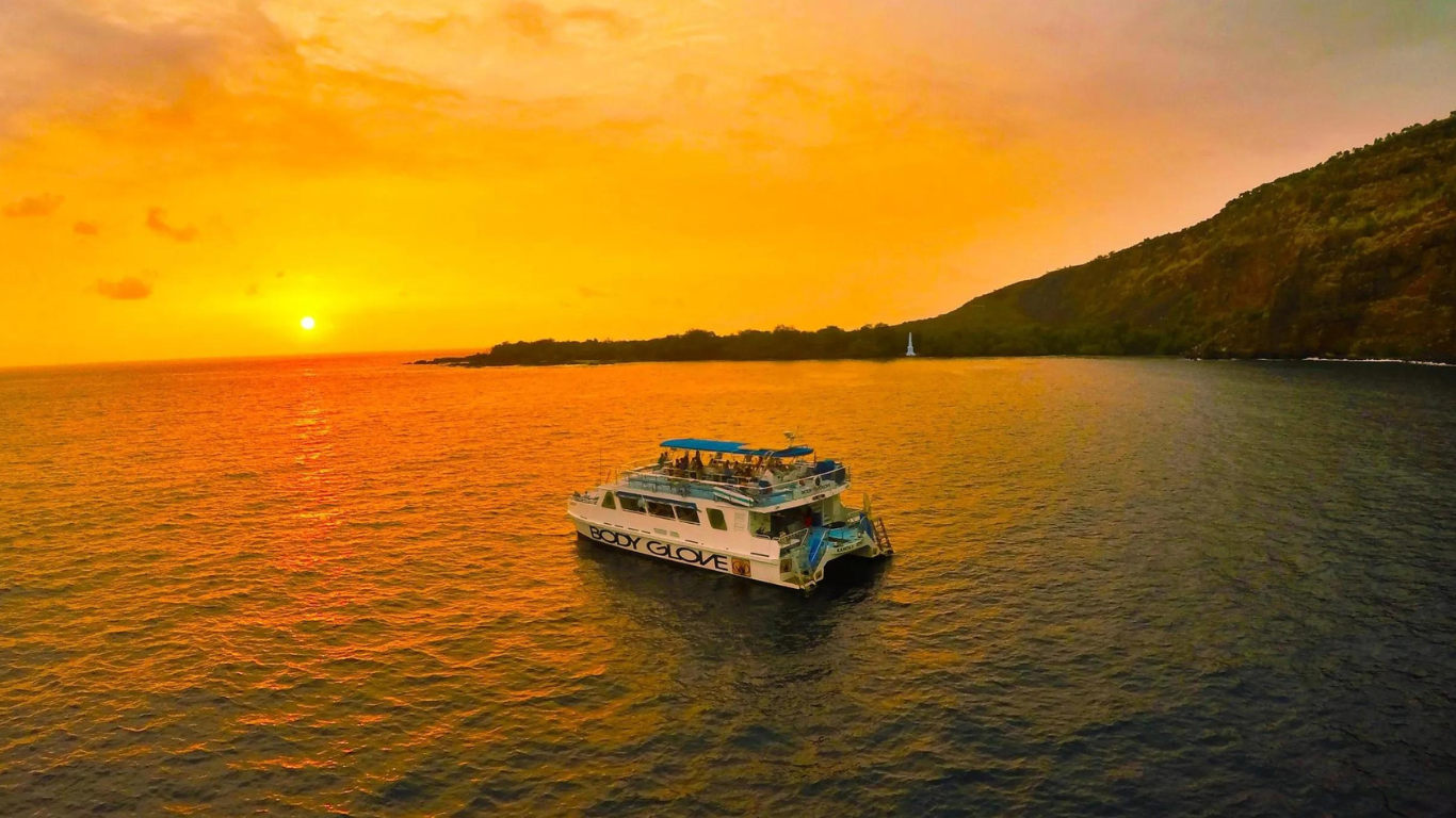 catamaran cruise ast sunset on the coast of the big island